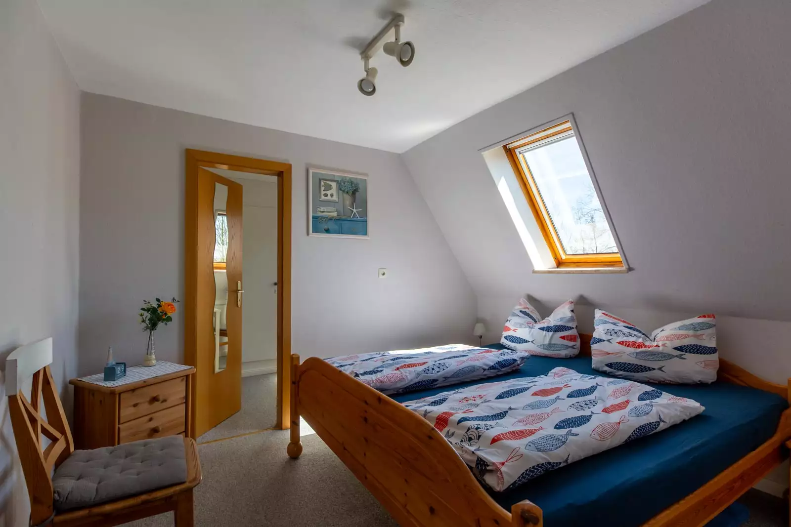 Schlafzimmer der Ferienwohnung Ankerplatz mit einem Doppelbett